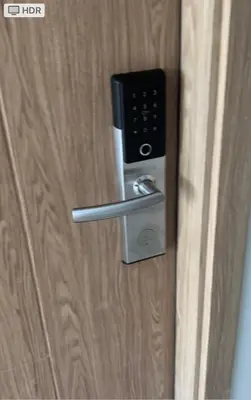 a door with a lock on a wooden door at Paranaque Manila Bloom residences in Manila