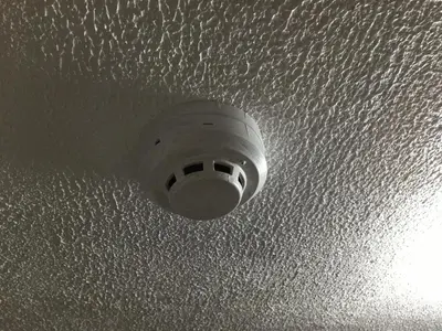a light on the ceiling of a room at Stay in Manila, Cambridge Village in Cainta
