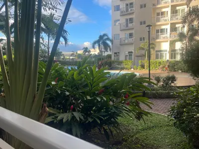 a view from the balcony of a resort at Simple Yet Special n SOUTH RESIDENCES in Manila