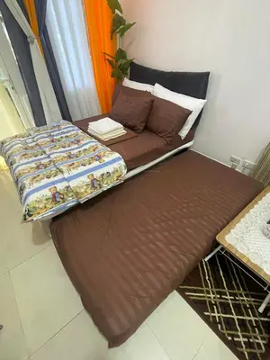 a bed in a room with a mattress on it at Simple Yet Special n SOUTH RESIDENCES in Manila
