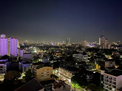 a city skyline at night with lit up buildings at Buenbyahe Cozy Affordable Place at Urban Deca Tower along EDSA Shaw MRT walking distance in megamall in Manila