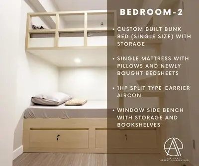 a bedroom with a bed with a loft bed with storage at Casa Escudero in Manila