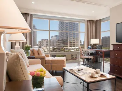 a living room with a view of a city at Discovery Primea in Manila