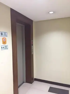 an empty room with a door and a hallway at Spacious Studio Apartment B203 in Manila
