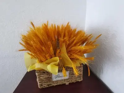 a basket filled with feathers on top of a table at Room accommodation in Manila