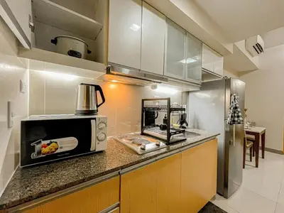 a kitchen with a toaster oven and a microwave at Prime Bgc Stay Near Uptown, Grand Hyatt #oursw18j in Manila
