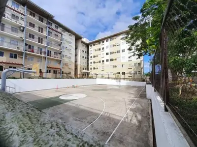 an empty basketball court in front of a building at Serenity in Style: Scandinavian Zen in Nuvali in Pitland