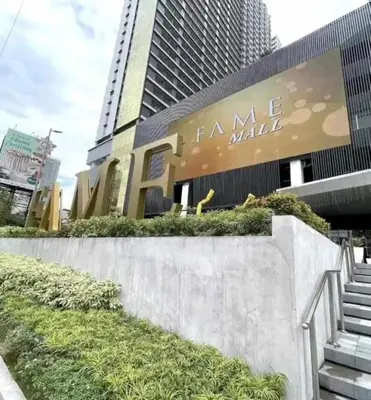 a building with a sign that reads fame mall at Fame Residences Pool View near MRT, Shaw, Megamall & Ortigas 1026 in Manila