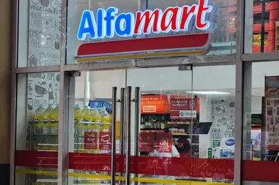 a store with an air mart sign in the window at 5 minutes to Jazz Mall! Studio-type condo 100mbps in Manila