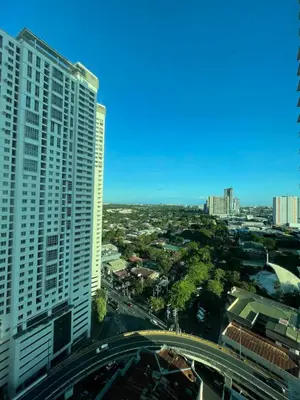 an aerial view of a city with tall buildings at Mountain View at Beacon Tower in Manila