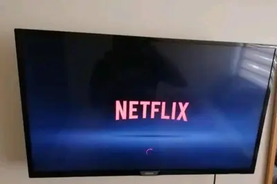 a television screen with the words netflix on it at Urban Deca EDSA Budget Place w/ Unli Wi-Fi Netflix in Manila