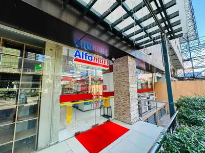 an entrance to an atm store with a red carpet at Urban Deca EDSA Budget Place w/ Unli Wi-Fi Netflix in Manila
