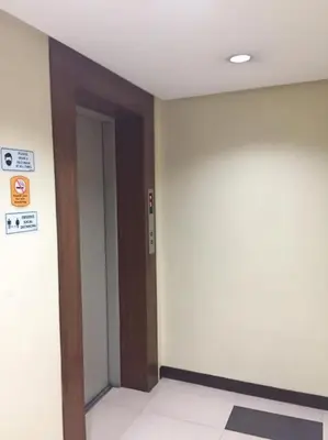 an empty room with a door and a hallway at Spacious Studio Apartment B302 in Manila