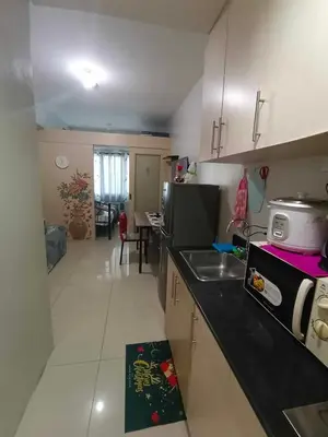 a kitchen with a sink and a counter top at 1BR SEA RESIDENCE by ABBY in Manila