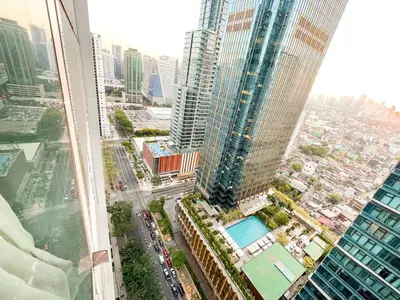 an aerial view of a city with tall buildings at Best BGC Condo Near Uptown Area #oursw30b2 in Manila