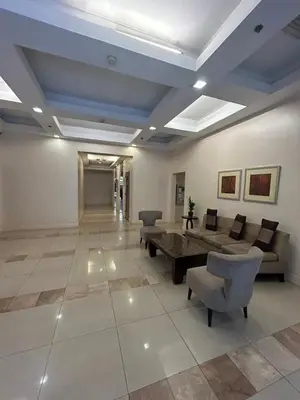 a large living room with a table and chairs at Relax in style: Modern Airbnb and Netflix in Manila