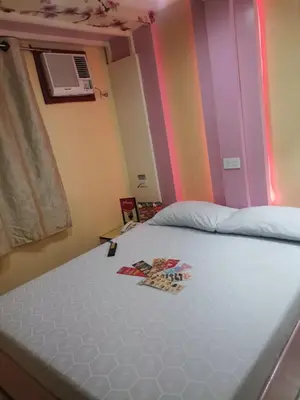 a close up of a bed in a room at Hotel Sogo Alabang Southroad in Manila