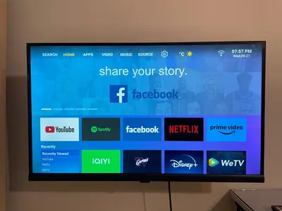 a television screen with different apps on it at SOHO Central EDSA Shaw Condo Pool front with SMART TV in Manila