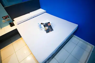 a white counter top with a book on it at Astrotel Divisoria in Manila