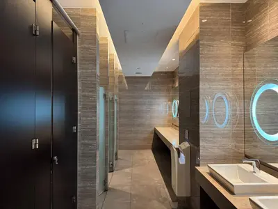 a bathroom with two sinks and a mirror at Quiet Condo with Fast WiFi, Own Balcony, Pool and Gym in Manila
