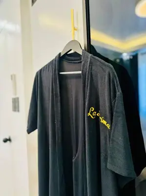 a shirt with the word ecmite on it on a rack at La Prima - The Perfect Urban Oasis in Santa Rosa