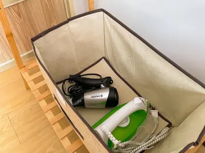 a box with a camera and a phone in it at Affordable Condo Near Bgc, Venice Mall #rt33006 in Manila