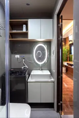 a small kitchen with a sink and a stove at COZY SKYLINE CONDO in MAKATI in Manila