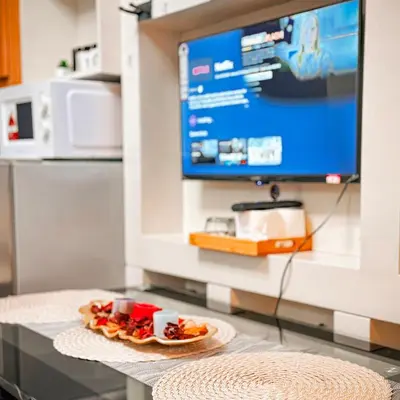 a plate of food on a counter in a laboratory at 633 Air Condo Pool View Escape Cozy 1BR w Sofa Bed in Manila
