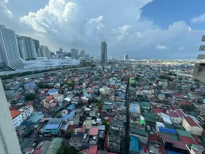 an overhead view of a city with many buildings at Fully Furnished 1BR Ridgewood Towers with 200Mbps WIFI in Manila