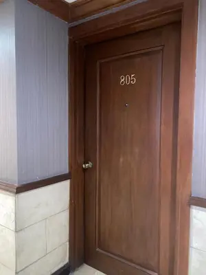 a wooden door with the number on it at Fernandina 88 Suites Condo in Manila