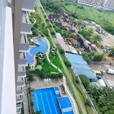 an aerial view of a resort with a swimming pool at Satori Residence in Manila
