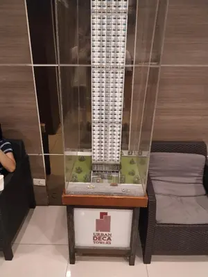 a model of a building in a display case at Nicecondote in Manila