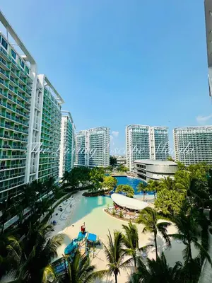 an aerial view of a resort with a swimming pool at Azure Urban Beach Residences with PS4 near Airport in Manila