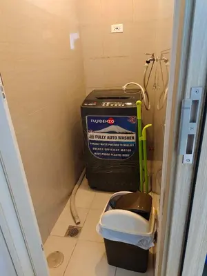 a bathroom with a large tank of water at Shore Res 2 Br 2Bath 1417 in Manila