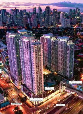 a large city at night with many tall buildings at Cozy 2BR 2Bath San Lorenzo Place Netflix 4KM NAIA in Manila
