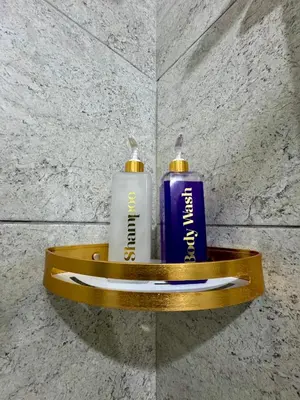 two bottles ofodorizers sitting on a shelf in a bathroom at AMA Tower Studio, 8th flr, near DMW and SM Megamall in Manila