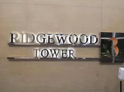 a sign for a rippwood topper on a wall at 1BR Condotel Ridgewood Towers Taguig City #RW10 in Manila