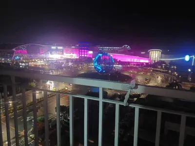 a view of a city at night with lights at Mall of Asia view from Balcony 15F in Manila