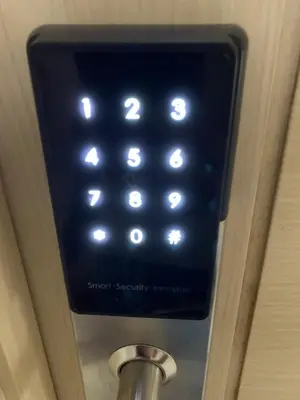 a close up of a door with an electronic key board at Your Happy Home in Mall of Asia in Manila