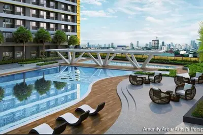 a pool on the roof of a building at Fame Residences EDSA Shaw MRT Shangrila Megamall in Manila