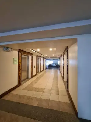 an empty hallway in a building with doors and floors at Torre de Manila Unit 1720 Taft Avenue Manila Unit 1720 in Manila
