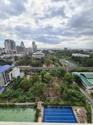 an overhead view of a city with a swimming pool at Torre de Manila Unit 1720 Taft Avenue Manila Unit 1720 in Manila