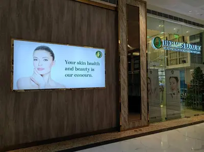 a sign on the side of a building at 1BR Condotel with Balcony at FAME Residences #FM03 in Manila