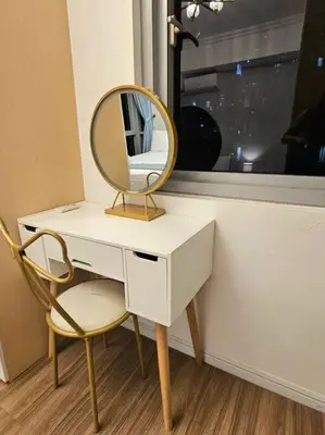 a dressing table with a mirror and a chair at The Infinity Towers in BGC - Spectacular 2BR near Hight Street in Manila