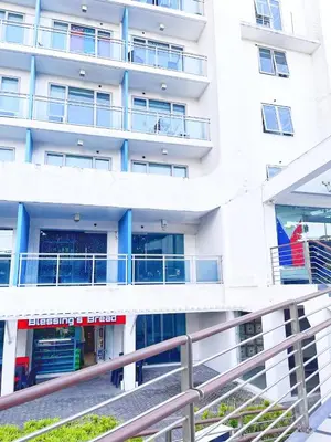 an external view of a building with a balcony at Hope Stays in Manila