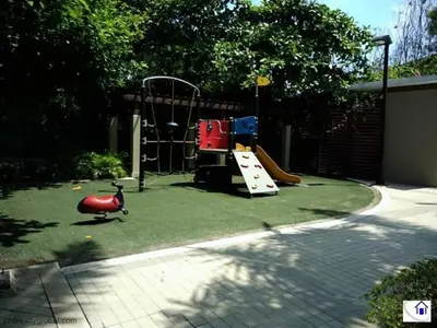 a playground with a slide and a play equipment at The Rochester, Bridgeview Tower - 1BR Apartment in Manila
