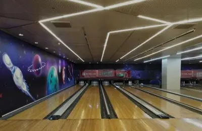 an empty bowling alley with a ball in it at Shell Residences Staycation near SM MOA in Manila