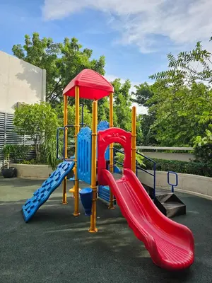 a playground with a slide and a slideintend at Affordable Condo Suite with 150mbps WIFI in Manila