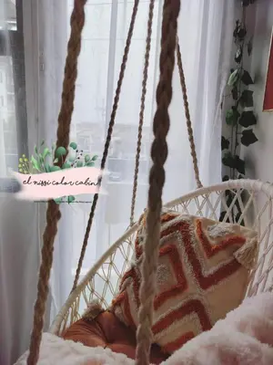a child sitting in a swing in a bedroom at El Nissi Staycation, THE COLOR CABIN, Enchanted Kingdom in Santa Rosa
