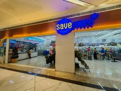 a save money store in a shopping mall at 1BR Condotel with Balcony at FAME Residences #FM49 in Manila